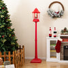 Red 5.3 feet musical Christmas street lamp with 60 LED lights, featuring Santa and snowman scene for festive decor.