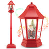 Red musical Christmas street lamp featuring Santa and a gift box scene, with 60 LED lights for festive holiday decor.