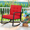 Red cushion rocking chair made of PE rattan and metal, perfect for outdoor patio relaxation with a rustic style.