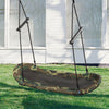 Saucer tree swing with camouflage design, adjustable height, and foam handles for comfort, perfect for outdoor use.