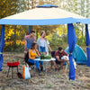 Pop up canopy tent in blue with friends gathered around a table, ideal for outdoor parties and picnics.