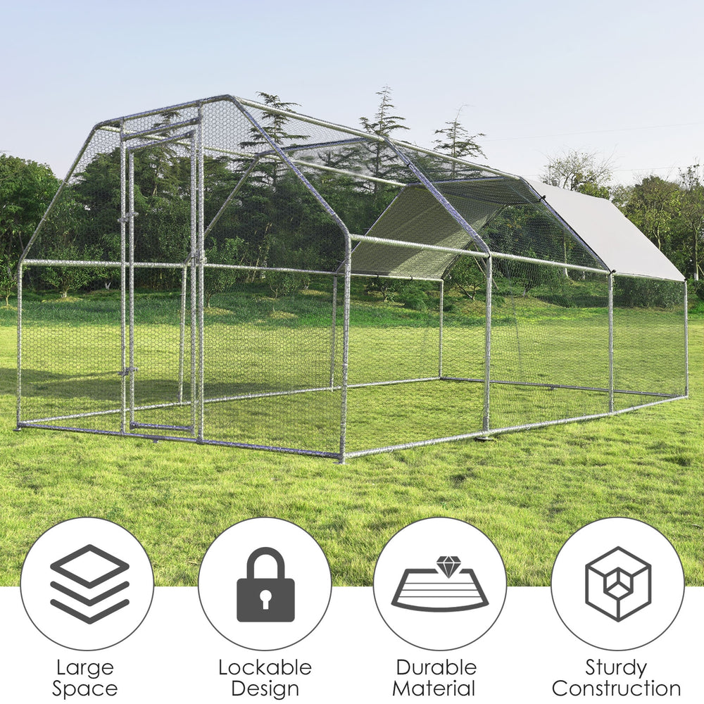 Large walk-in chicken coop with lockable steel door, durable galvanized frame, and waterproof cover for outdoor use.