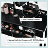 Vanity table set in black with lighted mirror, featuring 2 small and 2 large drawers for organizing makeup and jewelry.