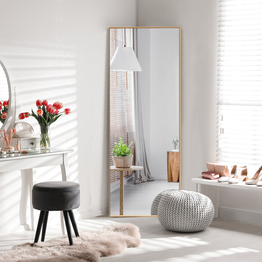 Full-length golden rectangle mirror with aluminum alloy frame, ideal for bedroom or entryway decor.