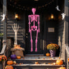 Pink life-size Halloween skeleton with movable joints, displayed on a porch, enhances outdoor festive decorations.