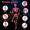 Close-up of the pink life-size Halloween skeleton's flexible joints, showcasing movable elbows, knees, and ankles for.