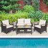 4-piece patio rattan furniture set with cushioned sofa and storage table, perfect for outdoor relaxation by the.