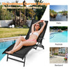 Black patio folding lounge chair with ergonomic armrests and adjustable backrest, perfect for poolside relaxation.