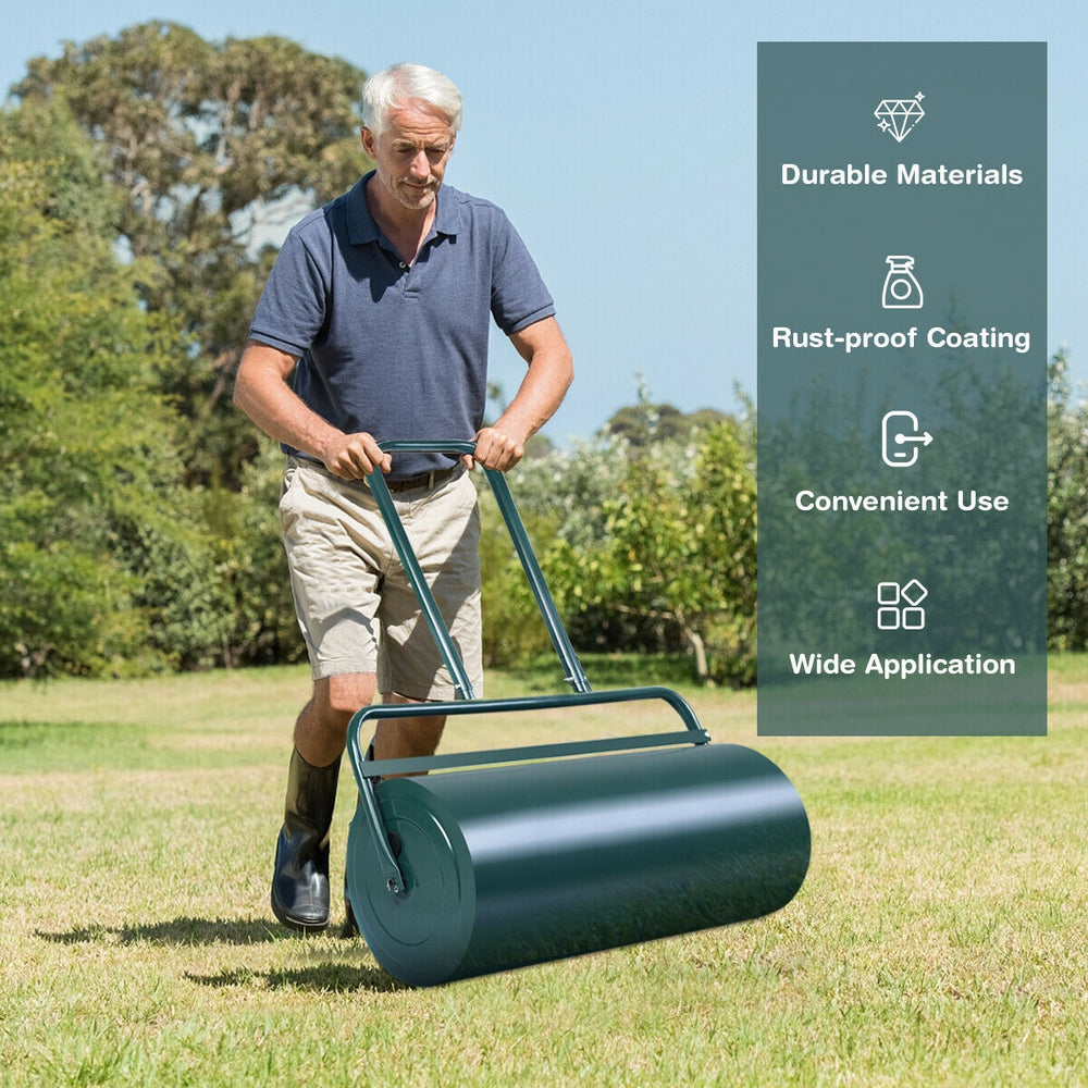 Push lawn roller with a green metal finish, ideal for leveling soil and packing down seed for a perfect lawn.