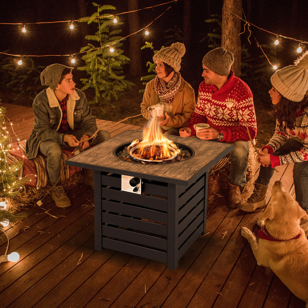 Square propane fire pit table with lava rocks, perfect for outdoor gatherings on the patio or garden.