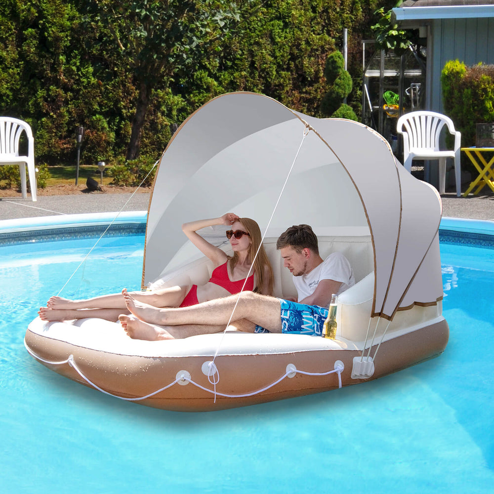 Inflatable pool float lounge with detachable sunshade, cup holders, and ergonomic design for comfortable relaxation.