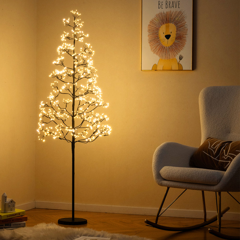 Lighted 5ft alpine tree with warm white LED lights, featuring a weighted base for stability and adjustable tips for a.