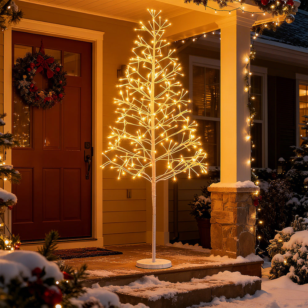 Lighted 5 FT birch tree with 240 warm white LED lights, featuring flexible branches and a weighted base for stability.