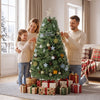 A family decorates a 5 FT artificial Christmas tree with 238 blossom pine needles and festive ornaments for the holidays.