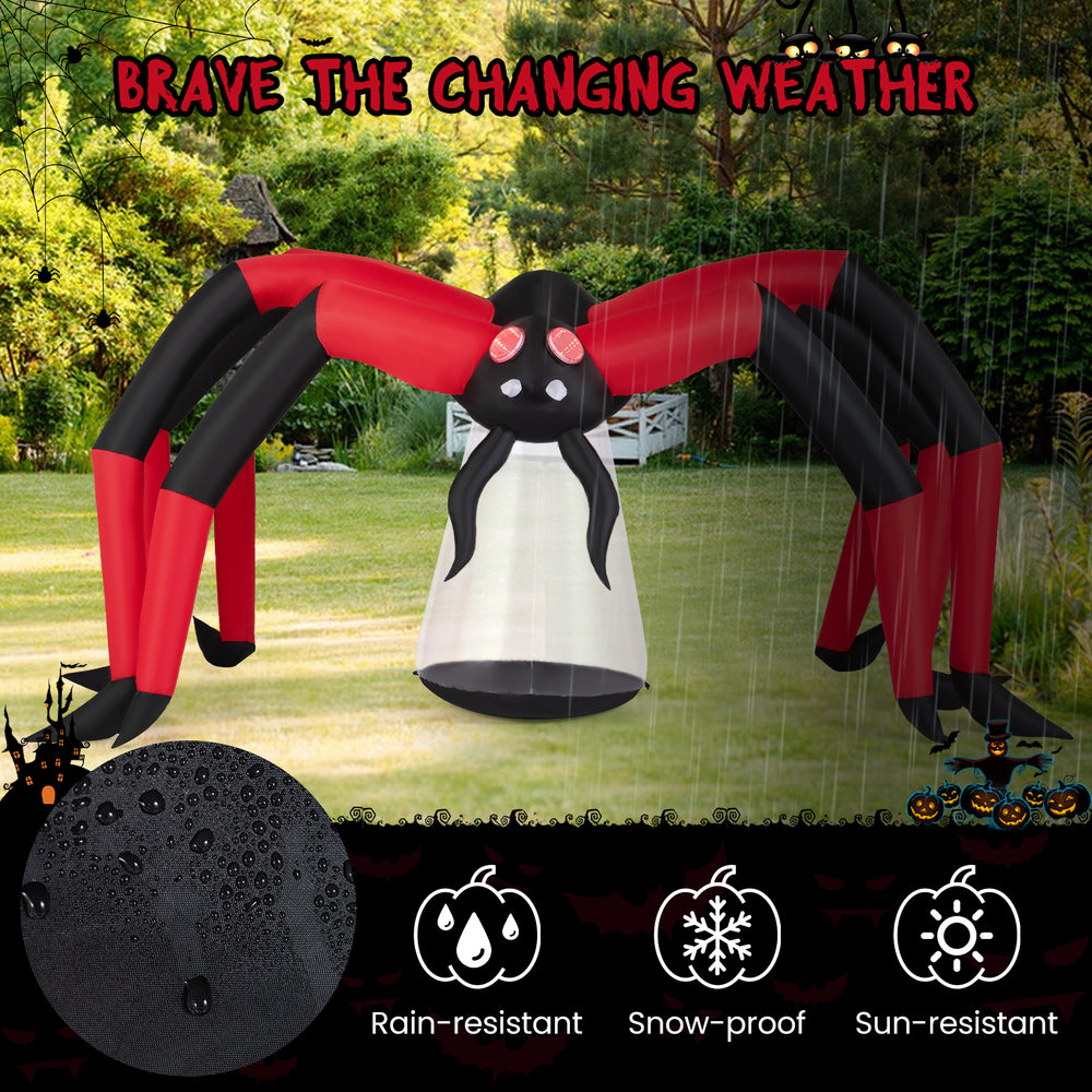 Halloween inflatable spider with red tunnel light eyes, 10-ft span, rain-resistant for outdoor spooky decor.