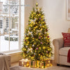5 FT pre-lit artificial Christmas tree with warm white and multicolor LED lights, pine cones, and ornaments in a living room.