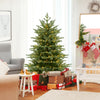 Lush 5-foot artificial Christmas tree with warm white LED lights and presents, perfect for holiday decor.
