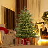 Lush 5-foot artificial Christmas tree with 200 warm white LED lights, beautifully decorated for festive home ambiance.
