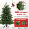 Full-bodied 5-foot artificial Christmas tree with 1426 PVC and PE branch tips, featuring 200 warm white LED lights.