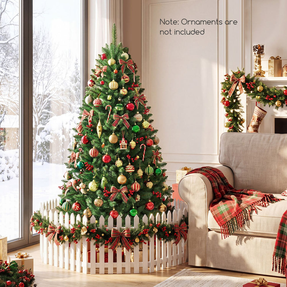 5 feet artificial fir Christmas tree with 600 branch tips and a foldable design, ideal for creating a warm holiday ambiance.