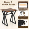 Industrial dining room set featuring a rustic brown table with X-shaped metal frames and adjustable foot pads for.