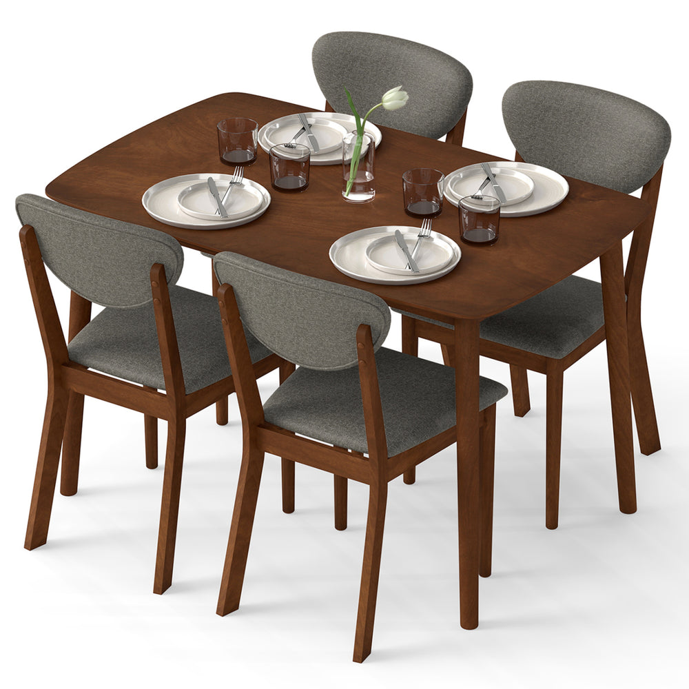 5-piece dining set featuring a rectangular table and four gray fabric chairs, perfect for kitchen or living room use.