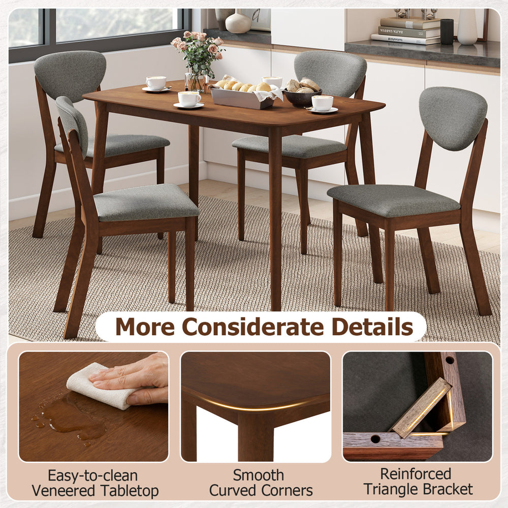 5-piece dining set featuring a rectangular table and four gray fabric chairs, perfect for kitchens or living rooms.
