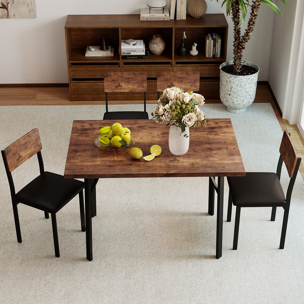 5-piece dining table set featuring a brown veneered MDF tabletop and 4 PU leather chairs, perfect for small spaces.
