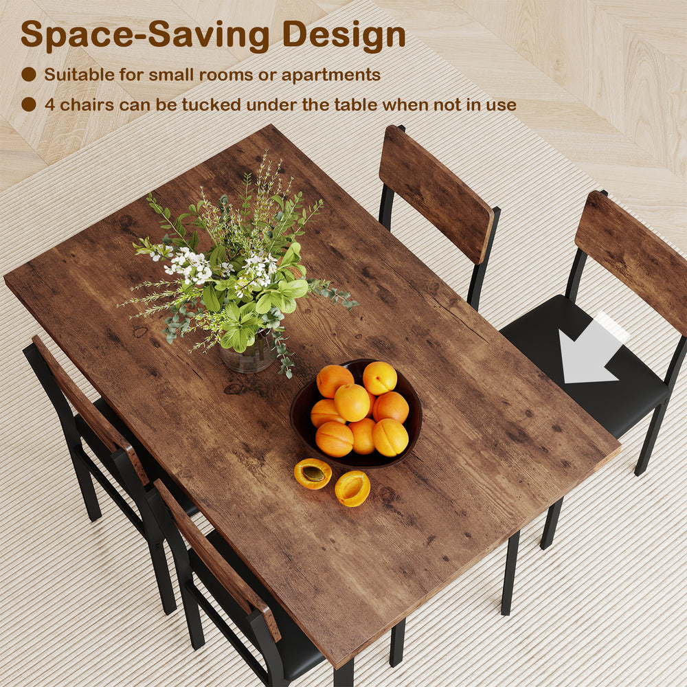 Side view of the 5-piece dining table set showing 4 PU leather chairs tucked under the brown veneered MDF table.