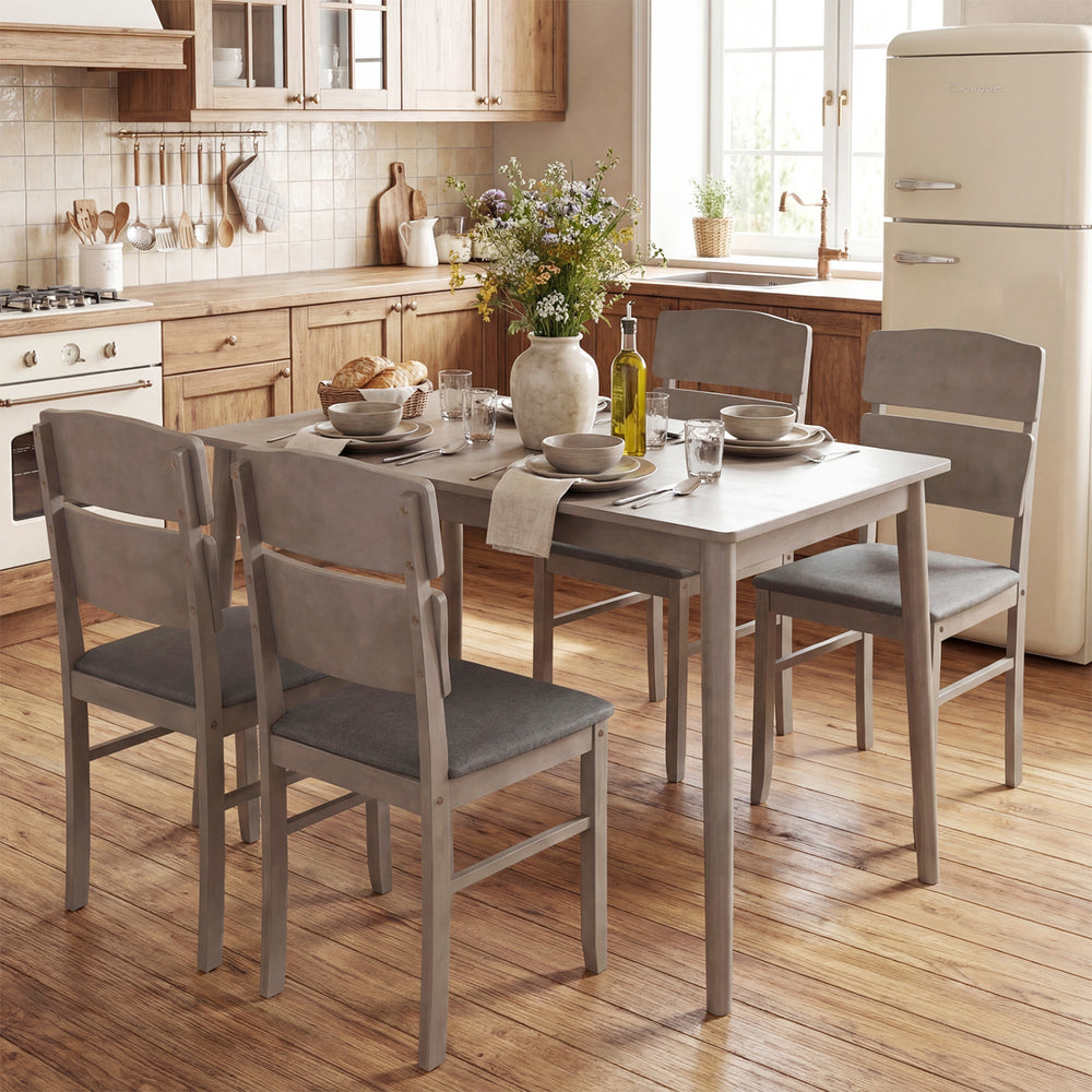 5-piece gray dining table set with high curved backs, featuring padded chairs and a waterproof tabletop for family.