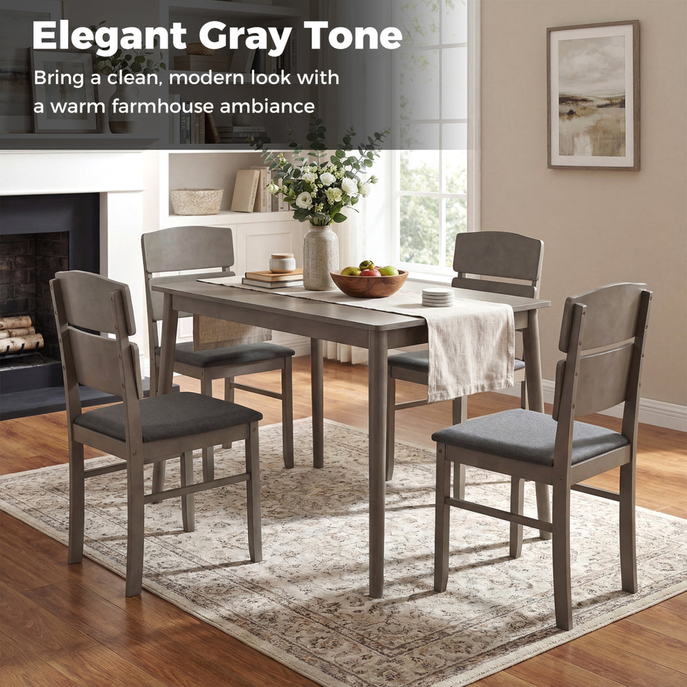 5-piece gray dining table set with high curved backs, featuring padded seats and a waterproof tabletop, perfect for.