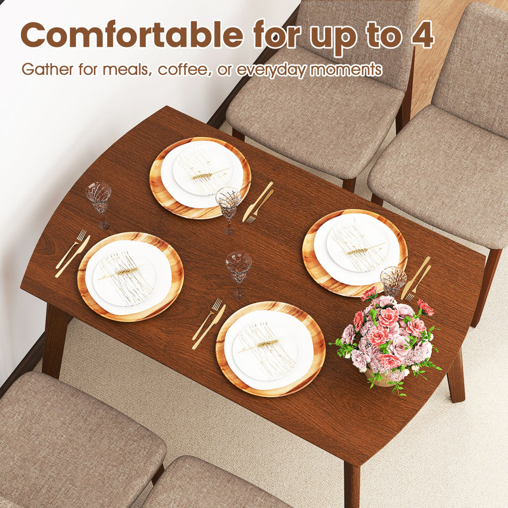 Light brown 5-piece kitchen table set with upholstered chairs, comfortably seating up to 4 for dining or gatherings.