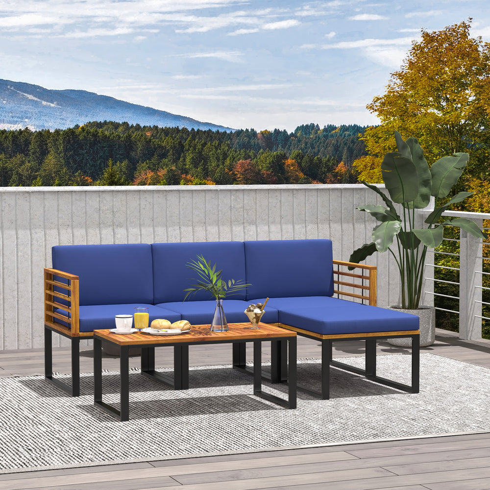 5-piece patio acacia wood chair set with navy cushions, featuring an ottoman and coffee table for outdoor relaxation.