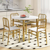 Round dining table set with four gold chairs, featuring a storage shelf and a smooth white surface for dining room use.