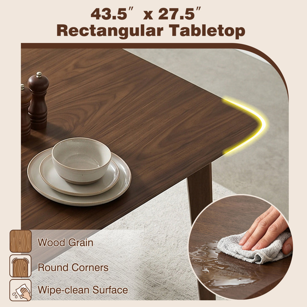 Rectangular walnut dining table surface with wood grain, round corners, and wipe-clean finish for small spaces.