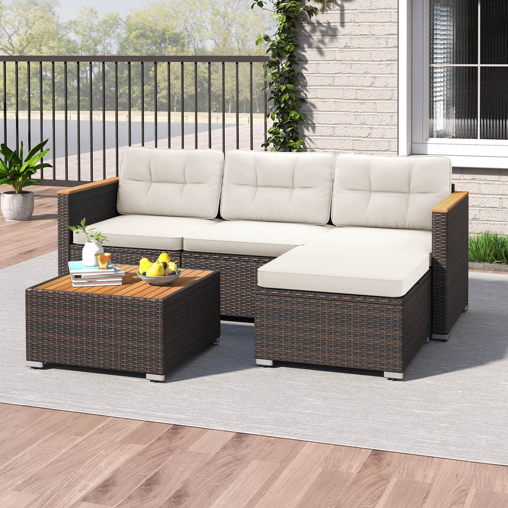 5-piece wicker conversation set with white cushions, featuring an acacia wood tabletop, ideal for outdoor patio.