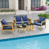 5-piece outdoor conversation set featuring navy cushions, acacia wood frame, and two coffee tables, ideal for poolside.