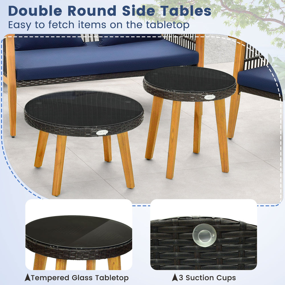 Round side tables with tempered glass tops and acacia wood legs, perfect for outdoor use by the poolside or backyard.