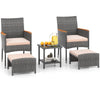 Patio conversation set featuring two armchairs, ottomans, and a side table with soft beige cushions for outdoor.