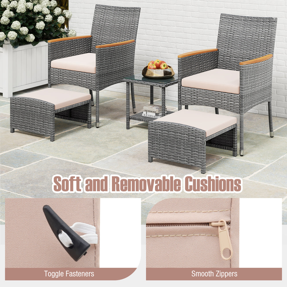 Patio conversation set featuring grey PE rattan chairs with soft beige cushions and versatile ottomans for outdoor.