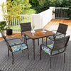 Square table with four cushioned rattan armchairs, perfect for outdoor dining in the backyard or poolside.