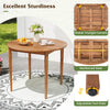 Round acacia wood dining table with adjustable foot pads, perfect for garden and backyard dining.