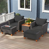 Patio furniture set featuring black armchairs, loveseat, and storage table, perfect for outdoor relaxation and gatherings.