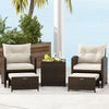 5-piece patio rattan furniture set featuring two off-white cushioned chairs, ottomans, and a tempered glass coffee.