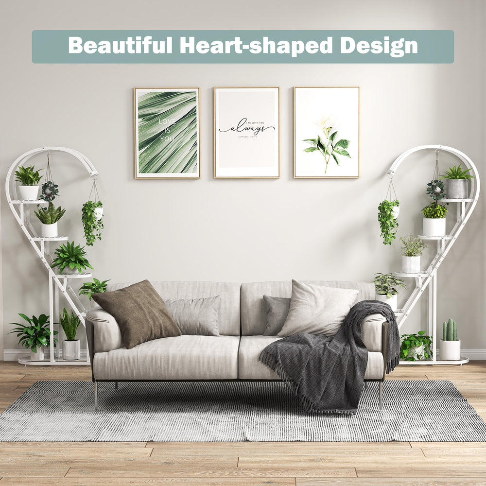 5 tier white metal plant stand with heart-shaped design, perfect for displaying multiple potted plants indoors.