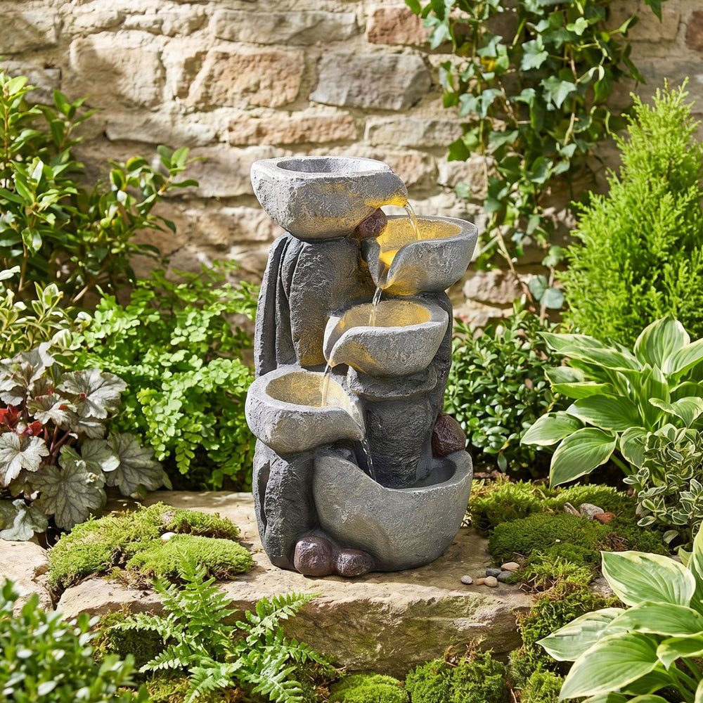 5-tier outdoor water fountain with LED lights, resin construction, and cascading design for relaxing ambiance in.