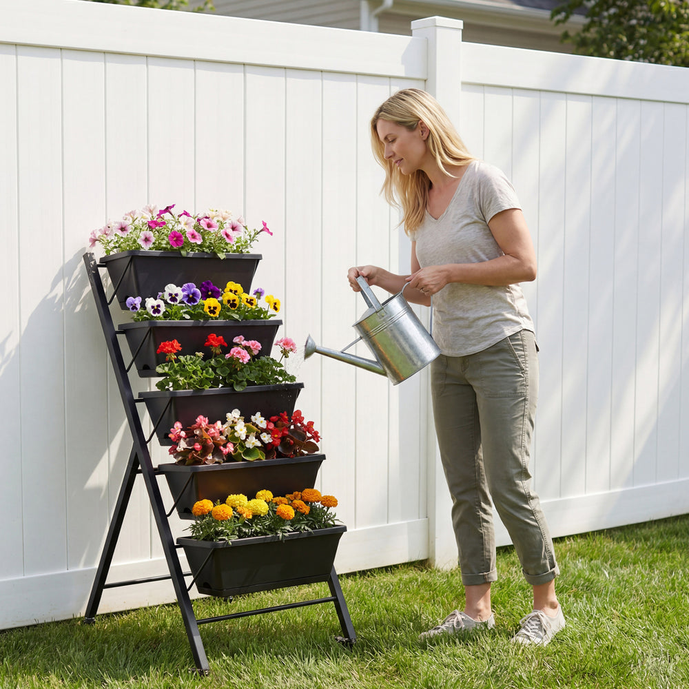 5-tier vertical raised garden bed with wheels, featuring removable trays and drainage holes, ideal for backyard.