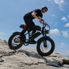 CycRun Pro Electric Mini Dirt Bike - rider on rocks - action shot