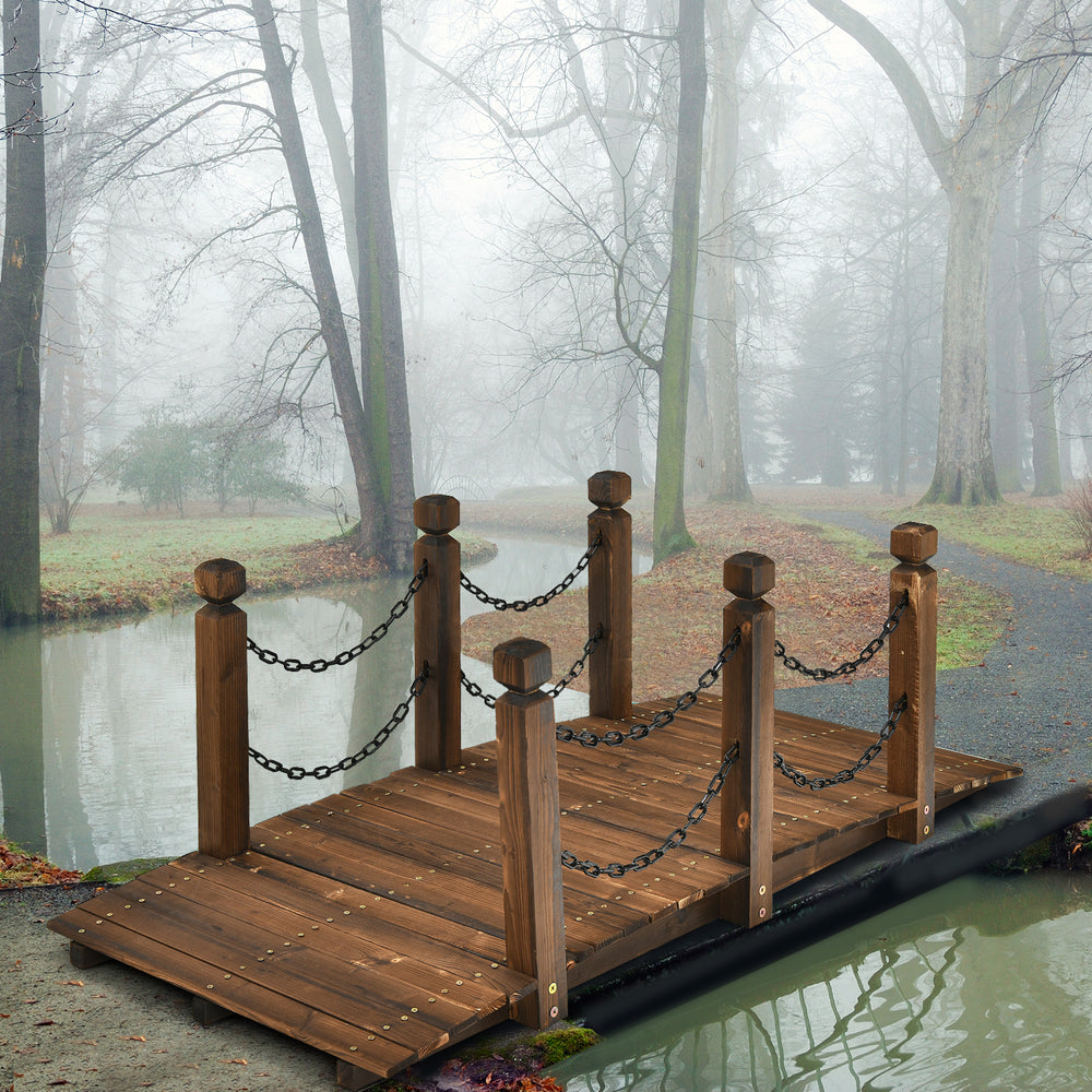 Wooden garden bridge with safety rails and stained finish, perfect for outdoor pathways and rustic decor.