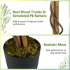 Close-up of realistic moss and wood trunks on a 5 FT tall artificial cherry blossom tree, perfect for home decor.